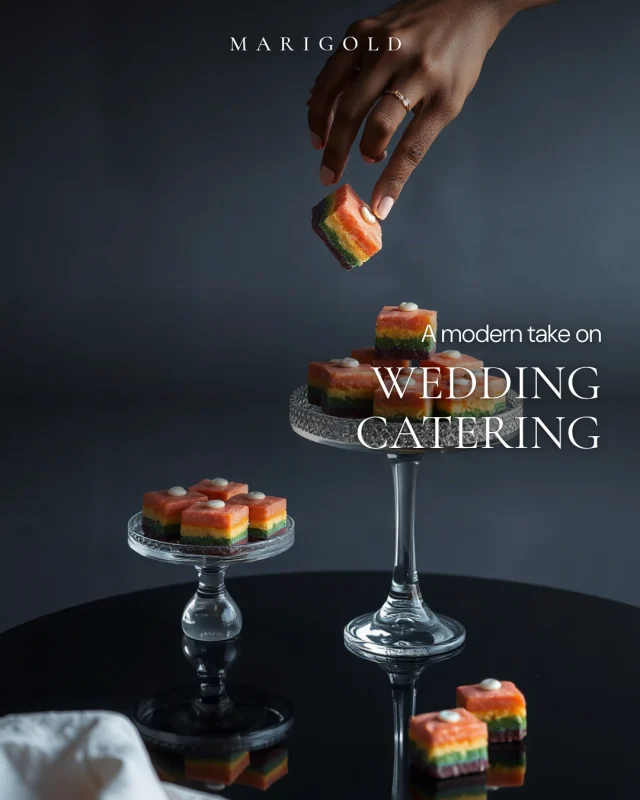 Marigold Catering post: A modern take on wedding catering: layered cakes on glass stands